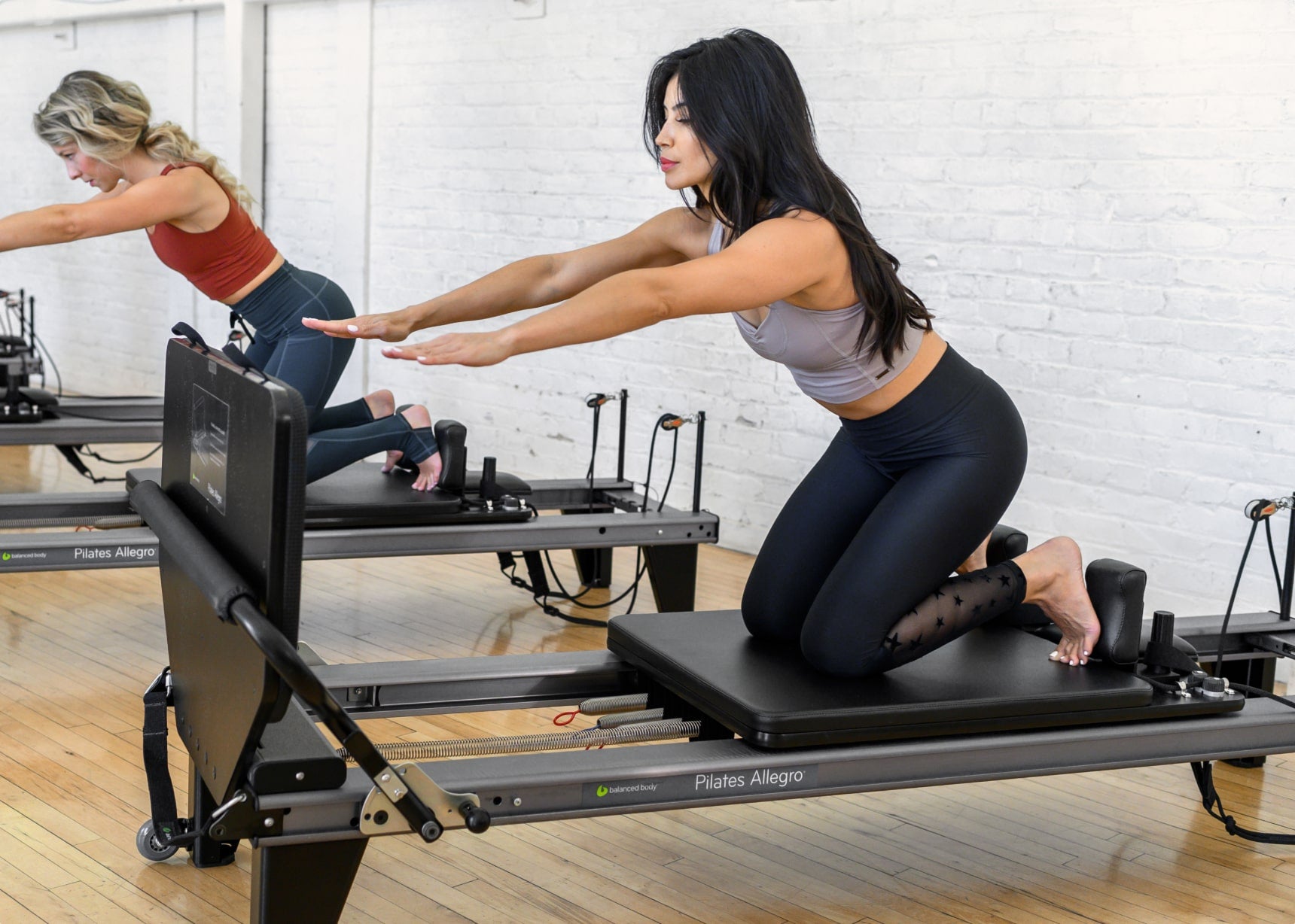 Photo of women working out using padded jumpboards