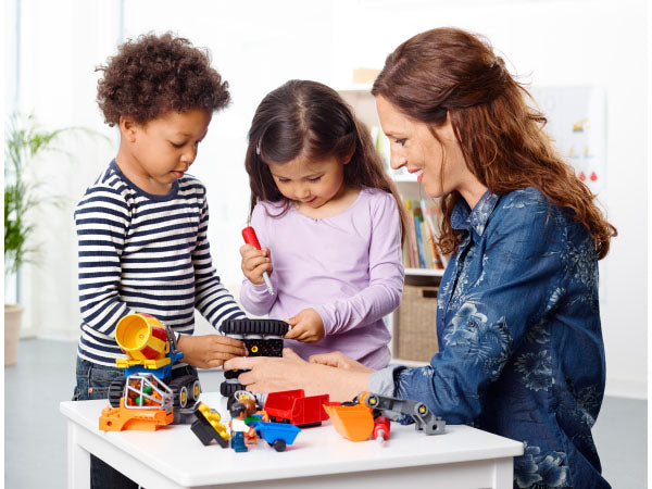 Students and Teacher creating with Tech Machines