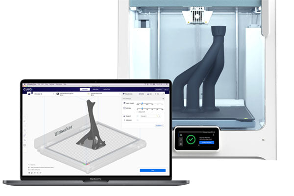UltiMaker Cura Software On Computer with 3D Printer Behind It