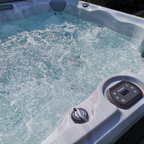 Sundance spas energy saving hot tubs isle of man