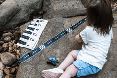 road tape being used outside on a boulder