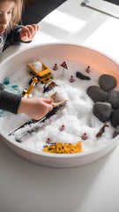 snow sensory play with road tape