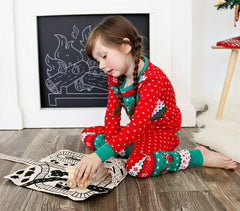 girls playing with train play mat