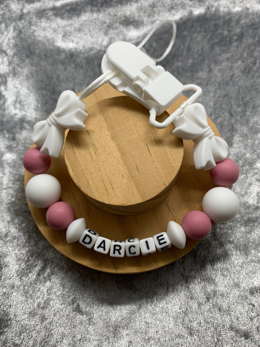Baby girls dummy clip made from soft silicone teething beads - mixture of dusky pink & white colours with a white plastic clip & 2 x bow shape topper bead - personalise with any name -PACIFIER CLIP - SOOTHER CLIP - TEETHER - DUMMY HOLDER
