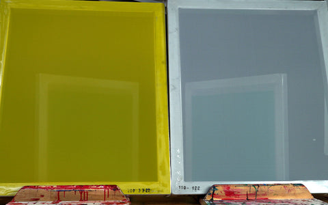 a yellow screen next to a white screen