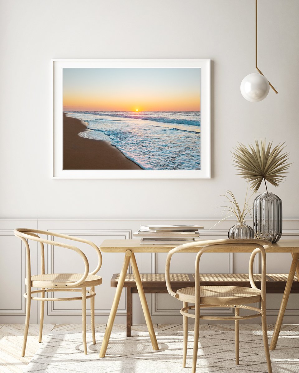 boho modern dining room decor featuring large framed summer sunrise beach photograph by Wright and Roam