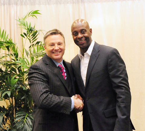 Dr Chestnut with NFL Hall of Famer Jerry Rice in Las Vegas
