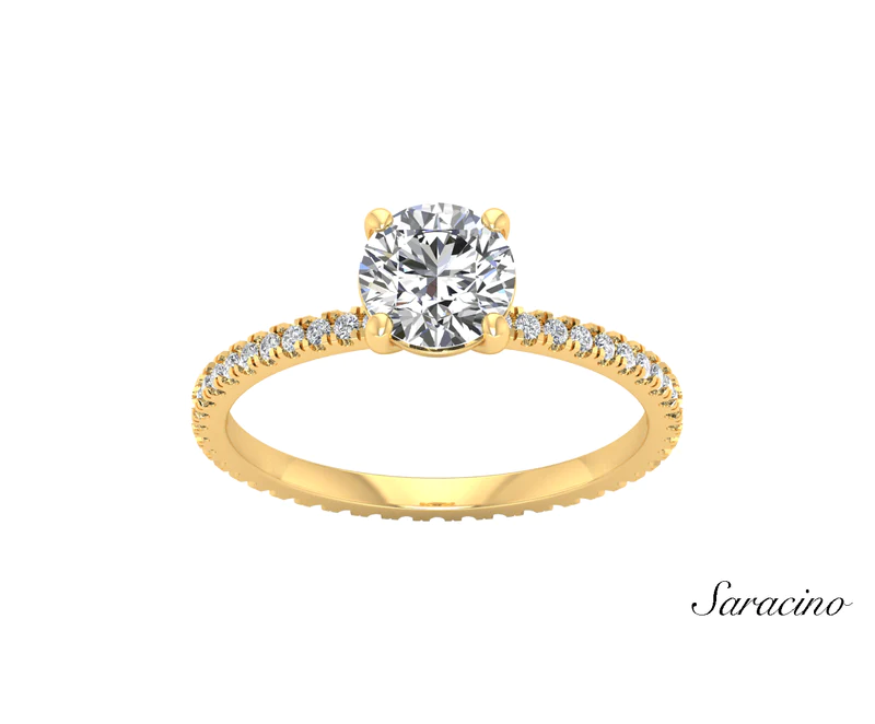 A brilliant cut engagement ring with a full diamond band