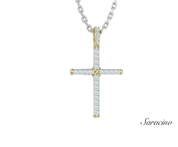 A diamond and gold crucifix necklace