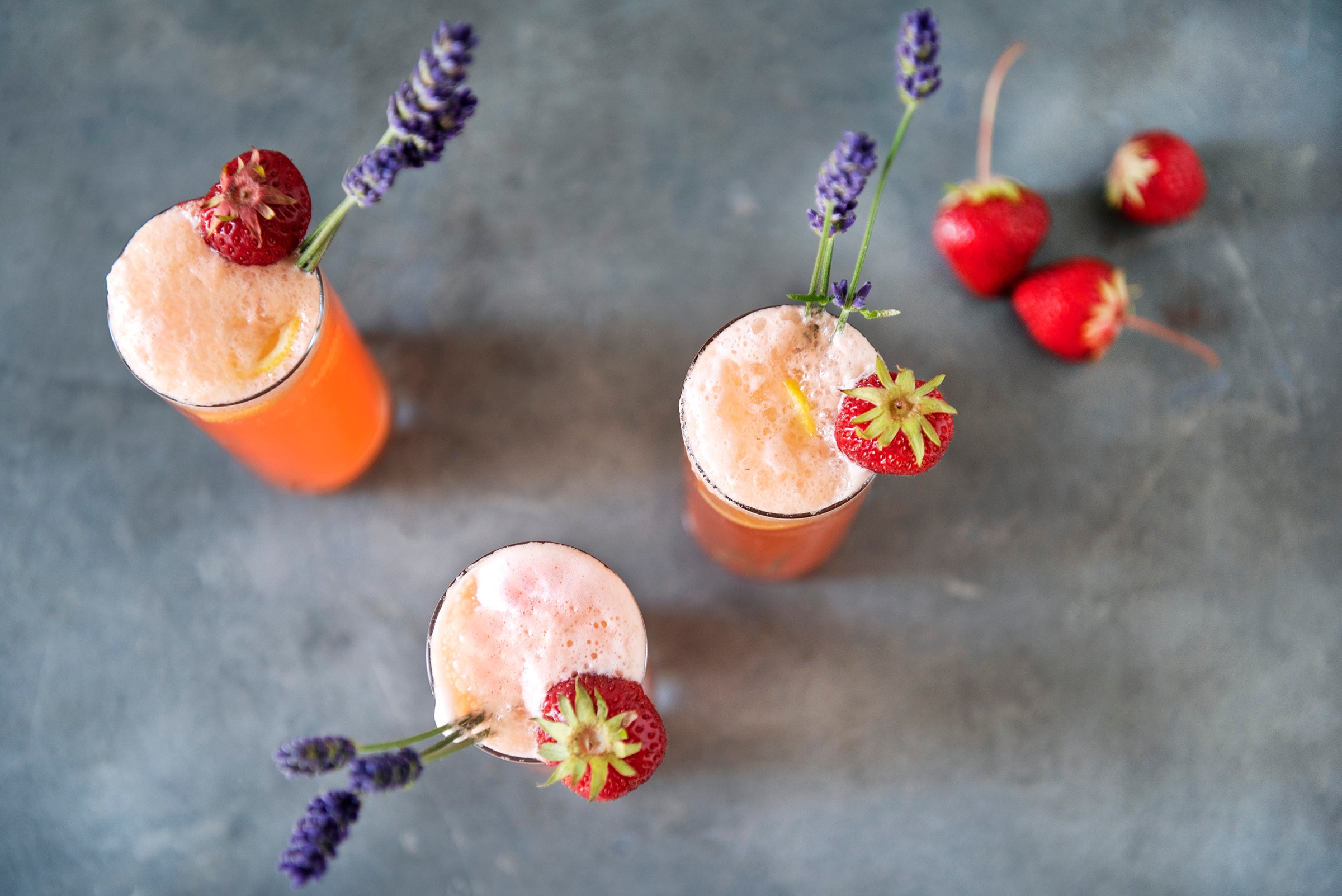 Lavender Gin Fizz with Strawberry Garnish made with Unruly Gin and Bilston Creek Farms Syrup