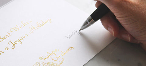 Hand-written message in company greeting card