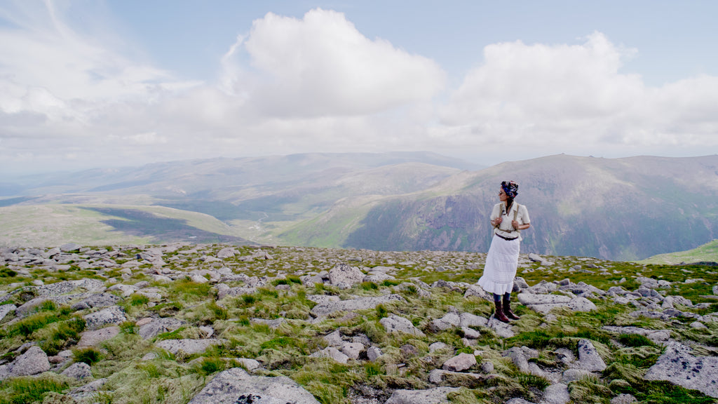 Elise Wortley Adventurer on a mountain with incredible view