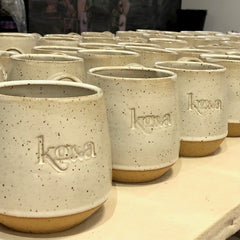 AneelaD ceramics custom handmade mugs in stoneware clay partially glazed for Kg&a in the greater toronto area