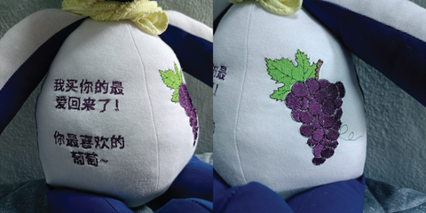 Words and a graphic of a bunch of grapes embroidered on the bereavement bear's tummy.
