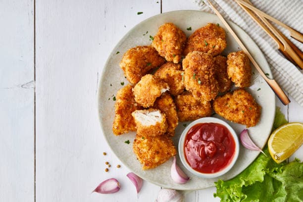 Nuggets empanadas com harina de almendras e pan sem glúten