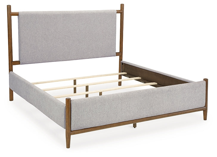 Lyncott King-Size Bed Upholstered Alongside a Mirrored Dresser