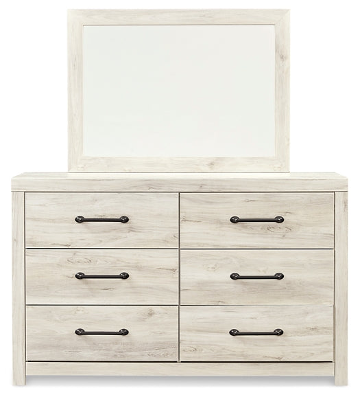 Cambeck Twin Panel Bed Accompanied by a Mirrored Dresser and Chest