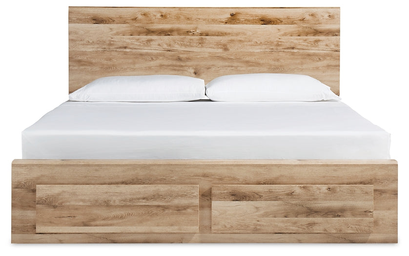 Hyanna King Panel Bed with Storage, Accompanied by a Mirrored Dresser and Nightstand