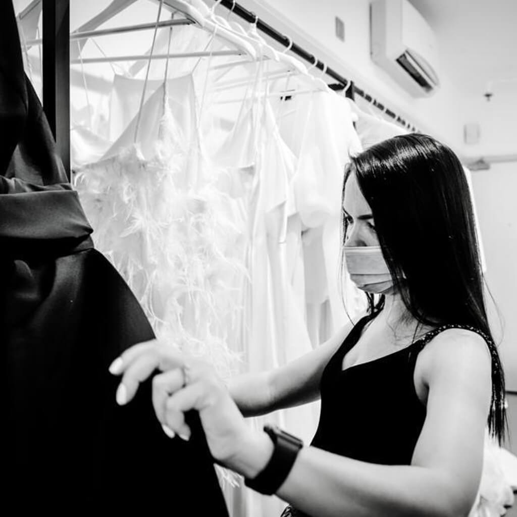 Bride shopping for wedding dresses inside the Christina Devine studio