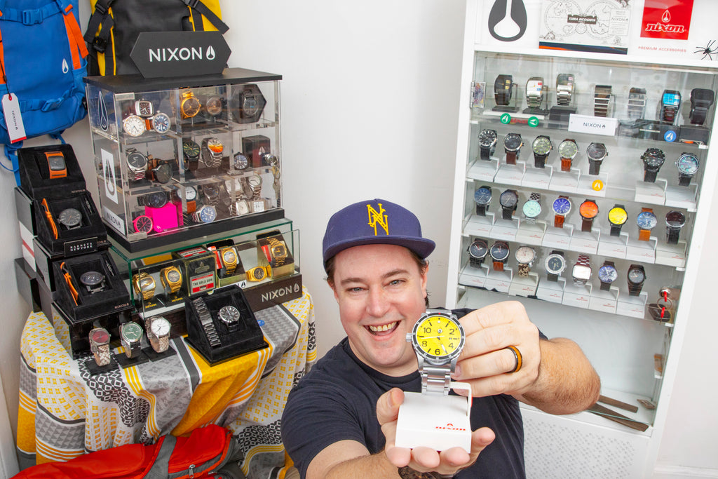 Andrew Prosser sits with his legendary collection of Nixon watches