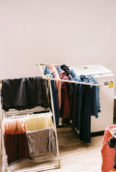 Photograph of clothes on a drying rack