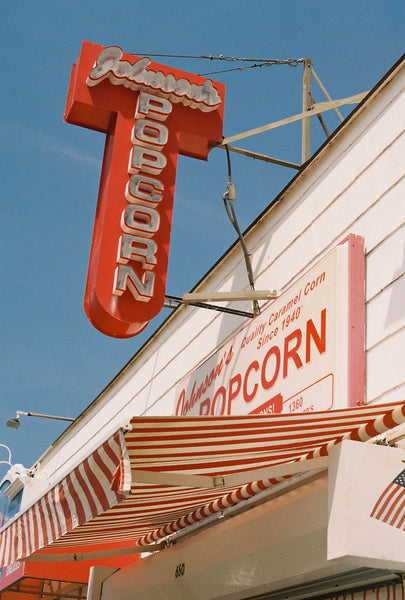 Photograph taken with a Konica Autoreflex TC of a store sign