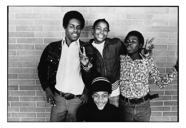 Photograph of a group of young people smiling