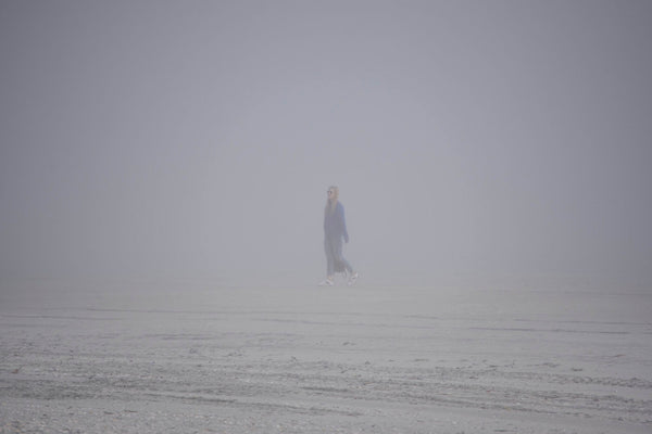 image of foggy subject on beach