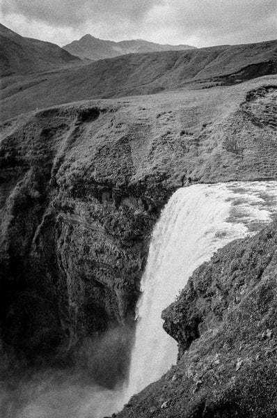 Photograph taken with Nikon F3 of the top of a waterfall cascading down cliff