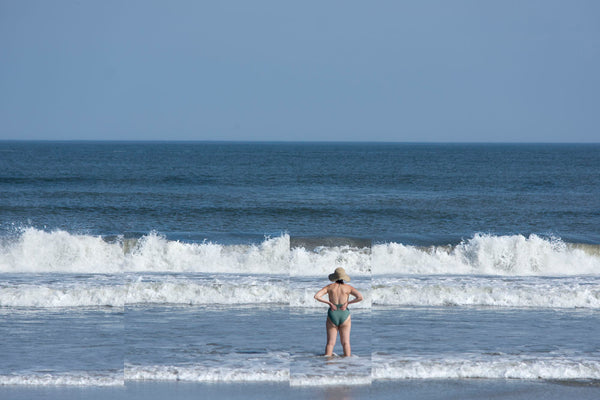 photograph of elderly woman at the beach