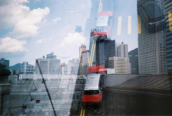 Double exposure photograph taken with a Canon EOS 300 of cityscape and street