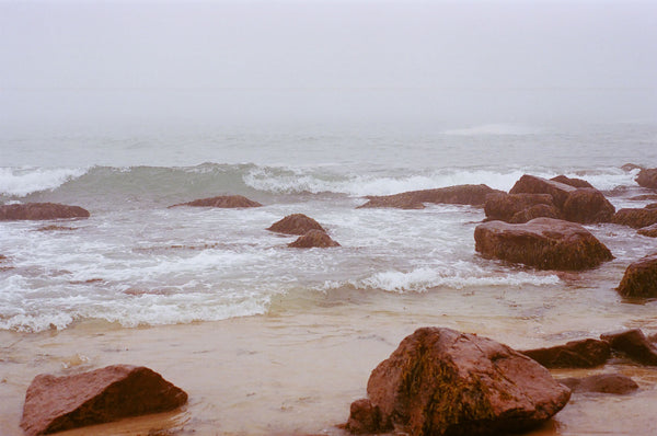 Photograph taken with a Pentax ME camera of foggy beach