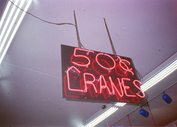 Photograph of neon sign in a restaurant