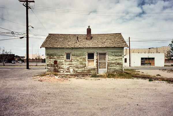 Photograph of run down shack on the side of the road