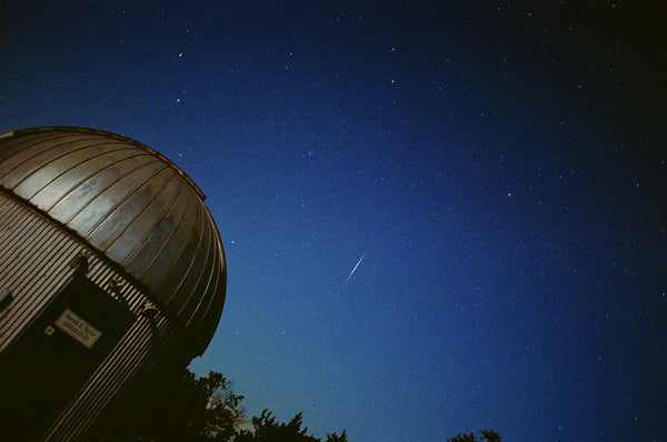Photograph taken with a Konica Autoreflex TC of the night sky