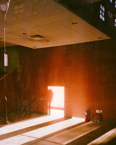 Photograph of light coming into a orange room