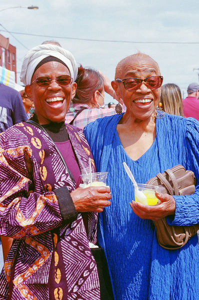 Photograph of two people smiling