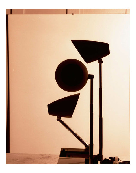 Photograph of different lamp shapes in shadow