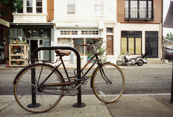 Photograph taken with a Konica Autoreflex TC of a bike locked on a street