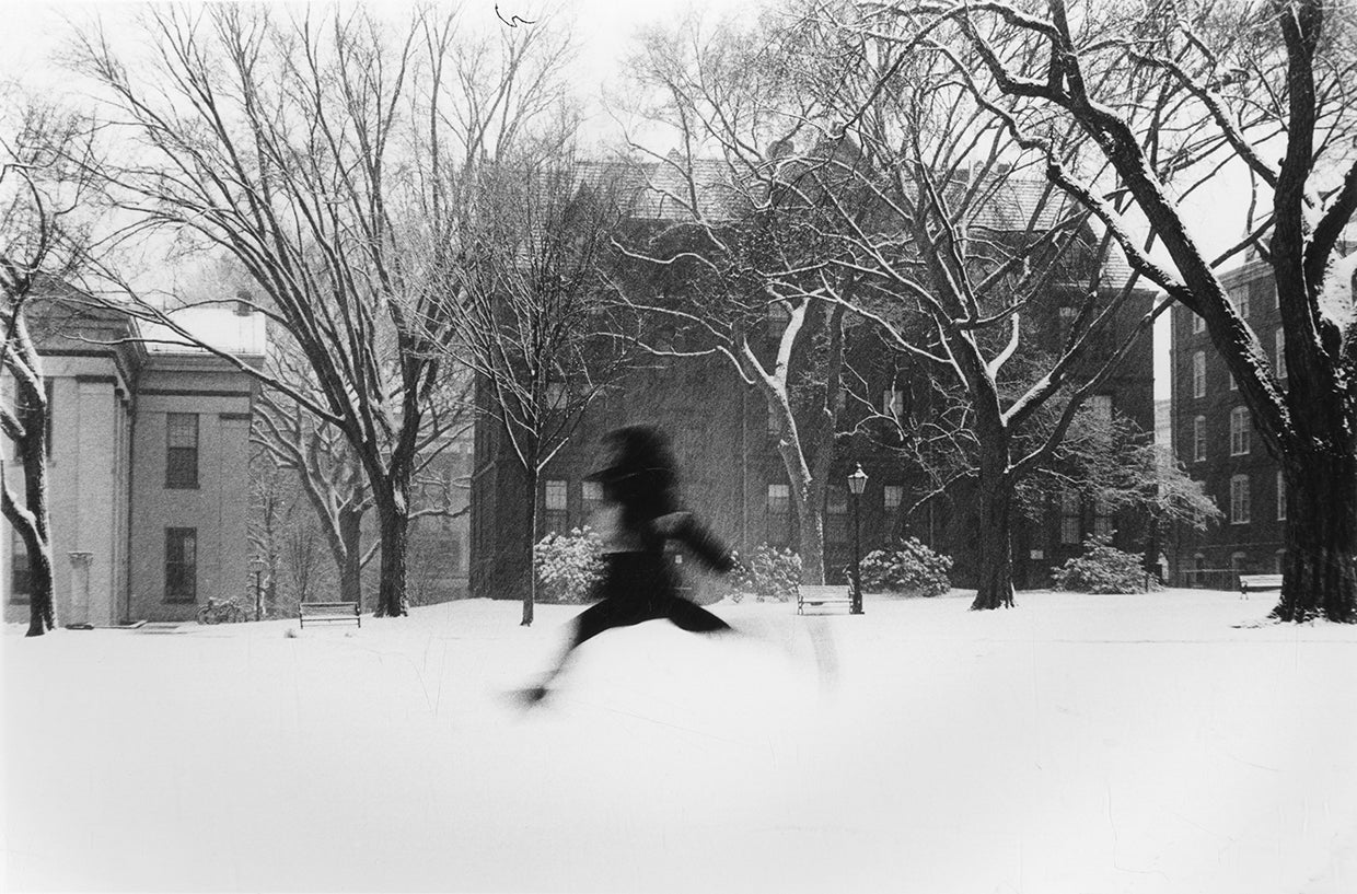 Photograph of someone jumping through a snowy landscape