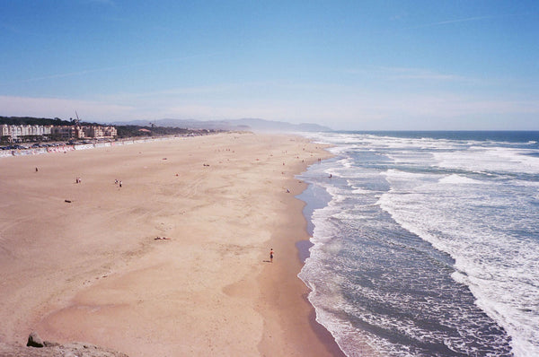 Photograph looking down at a beach 