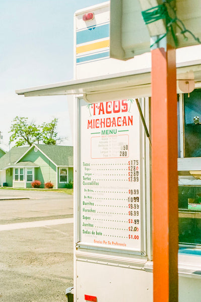 Photograph of drive through sign to a taco restaurant