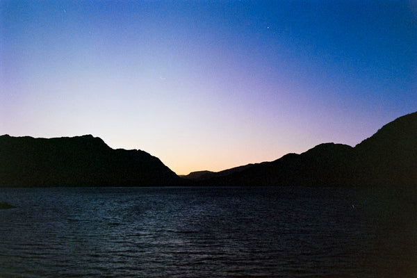 Photograph of silhouetted landscape at dusk