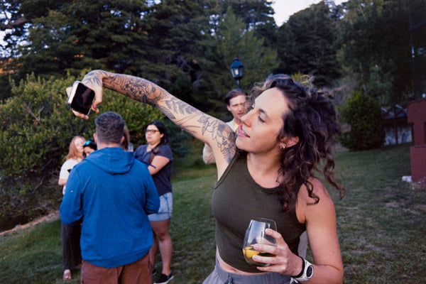 Photograph of someone taking a photo with their phone
