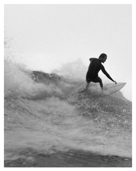 Photograph of someone surfing