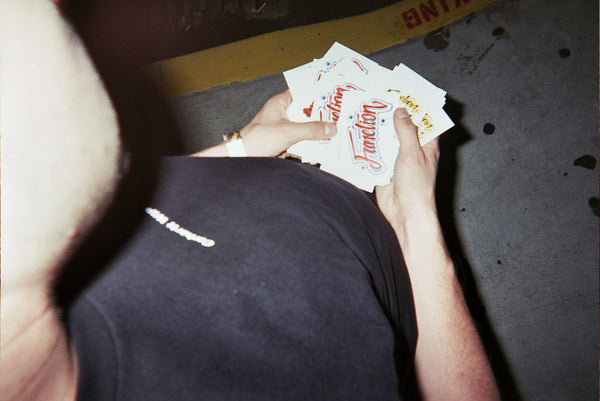 Photograph of someone holding cards