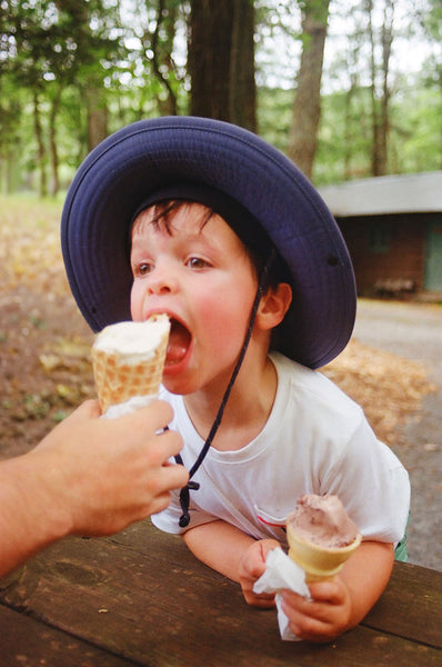 Photograph of kid eating ice cream