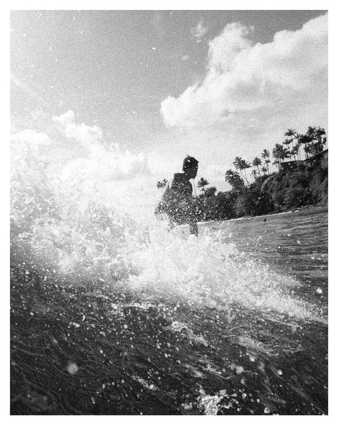 Photograph of someone surfing