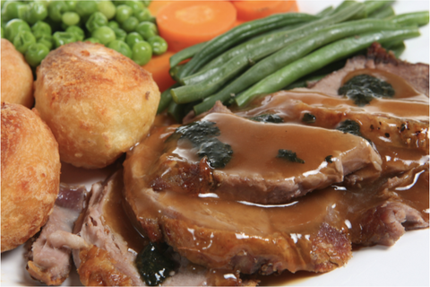 Beef roast with potatoes, green beans, carrots & peas