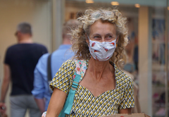 Person wearing reusable face mask